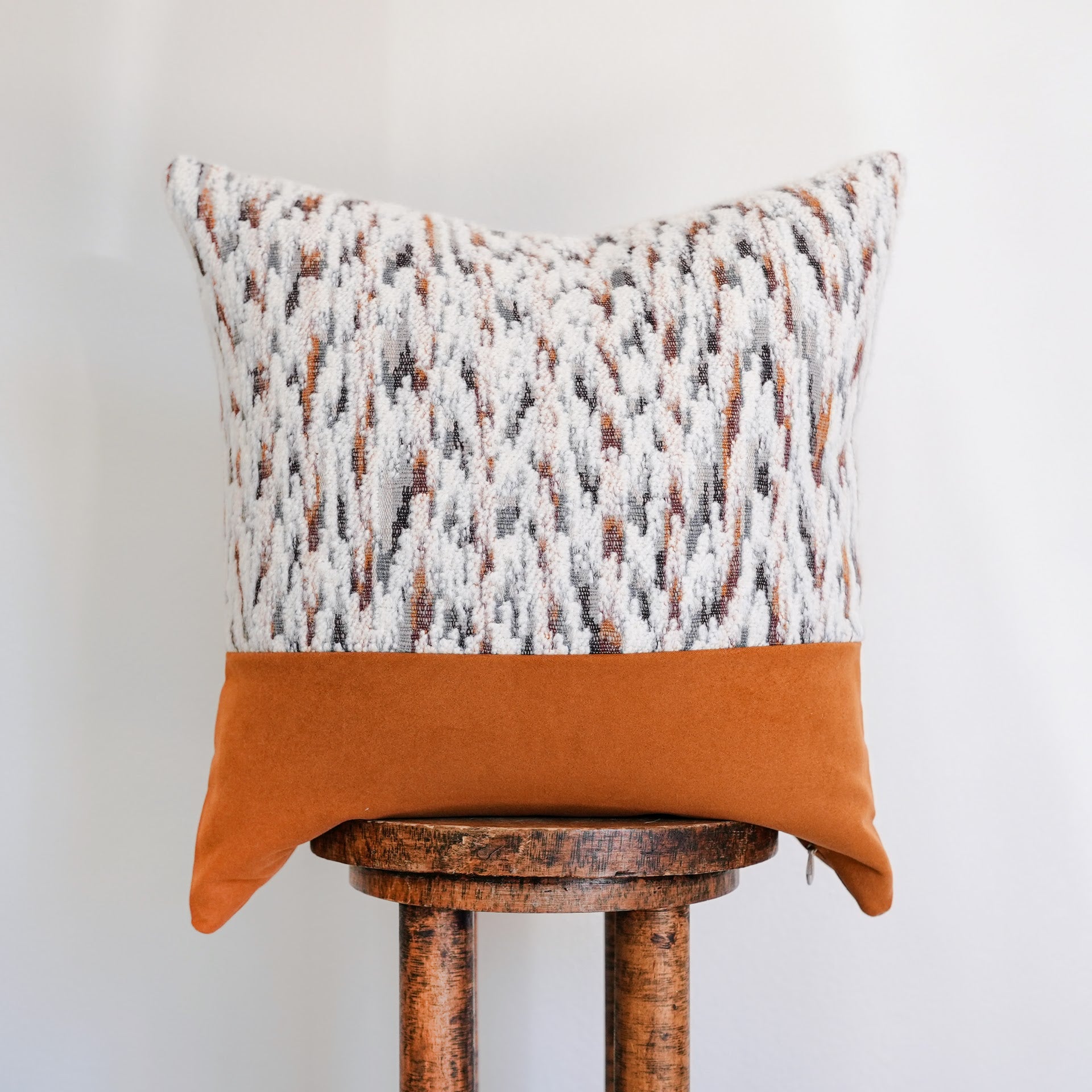 White Wool with Striations Capped with Orange Felt Wool Pillow 20x20